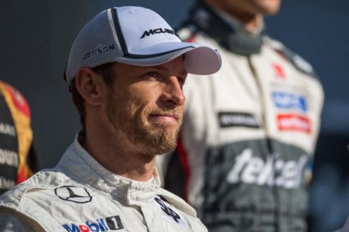 Button resorts to jokes as McLaren wait continues
